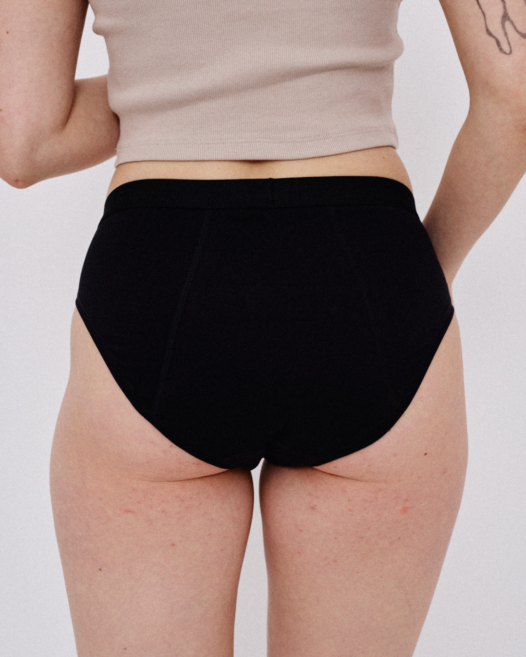 Menstruationstrusse med lav talje
